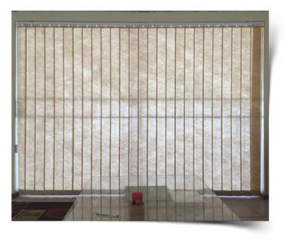 A 127mm vertical blind slided to cover the sliding door and turned in the closed position.