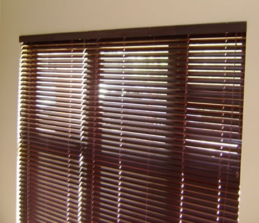 Light filtering through 50 mm Aluwood Dark Mahogany Venetian Blind